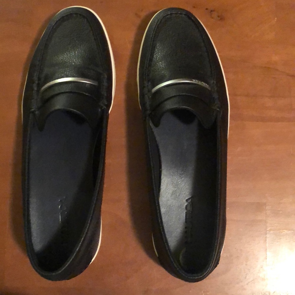 Worn leather casual flats